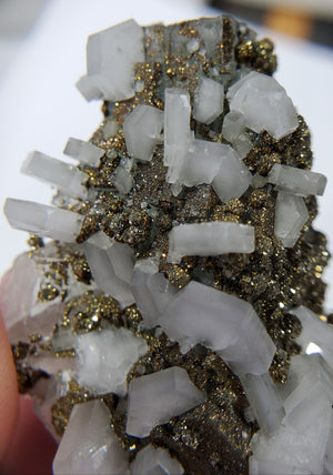 Calcite and Pyrite on Fluorite