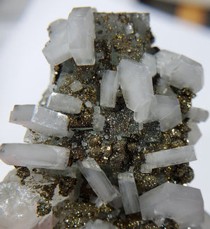 Calcite and Pyrite on Fluorite