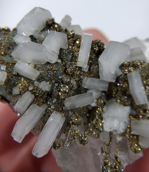 Calcite and Pyrite on Fluorite