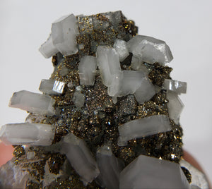 Calcite and Pyrite on Fluorite