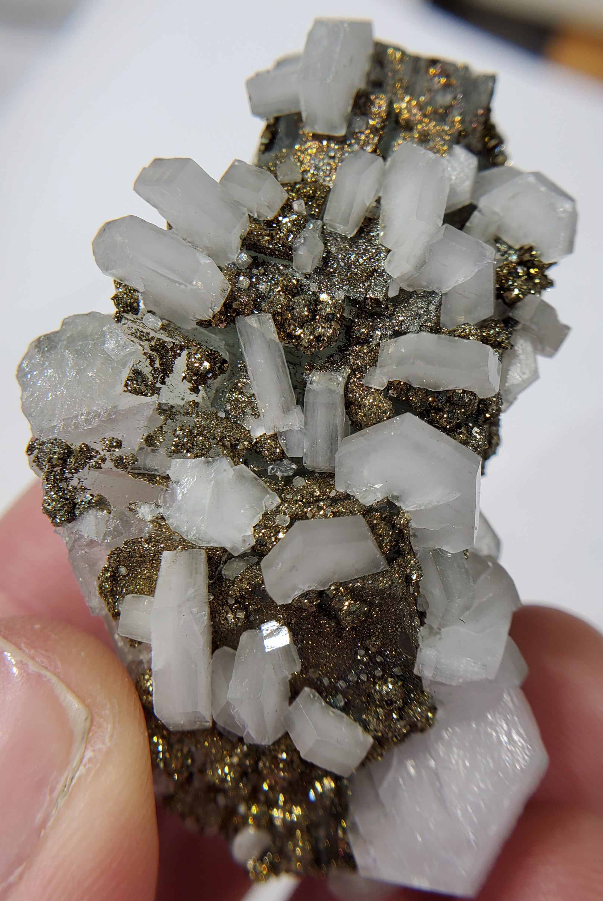Calcite and Pyrite on Fluorite