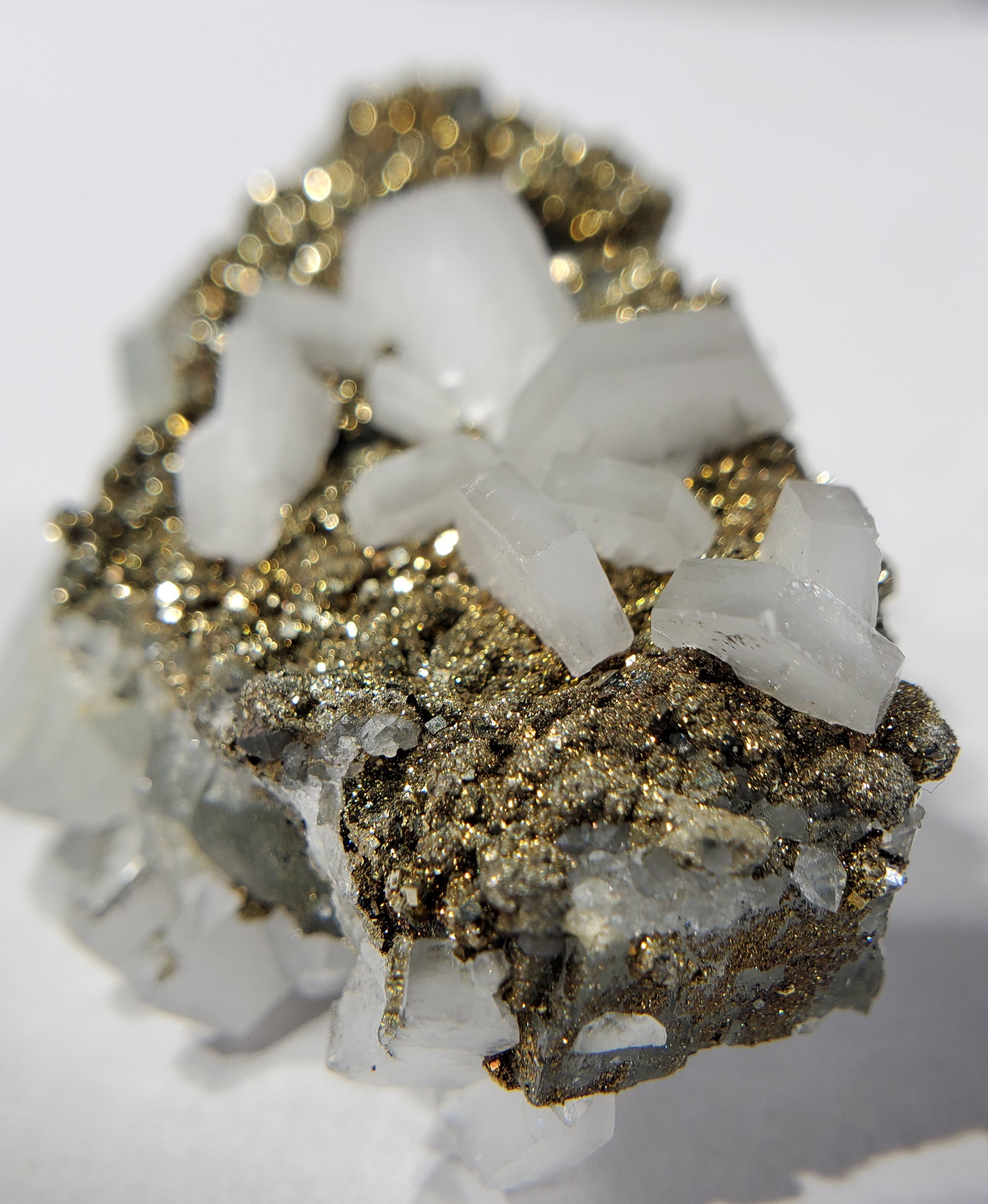 Calcite and Pyrite on Fluorite