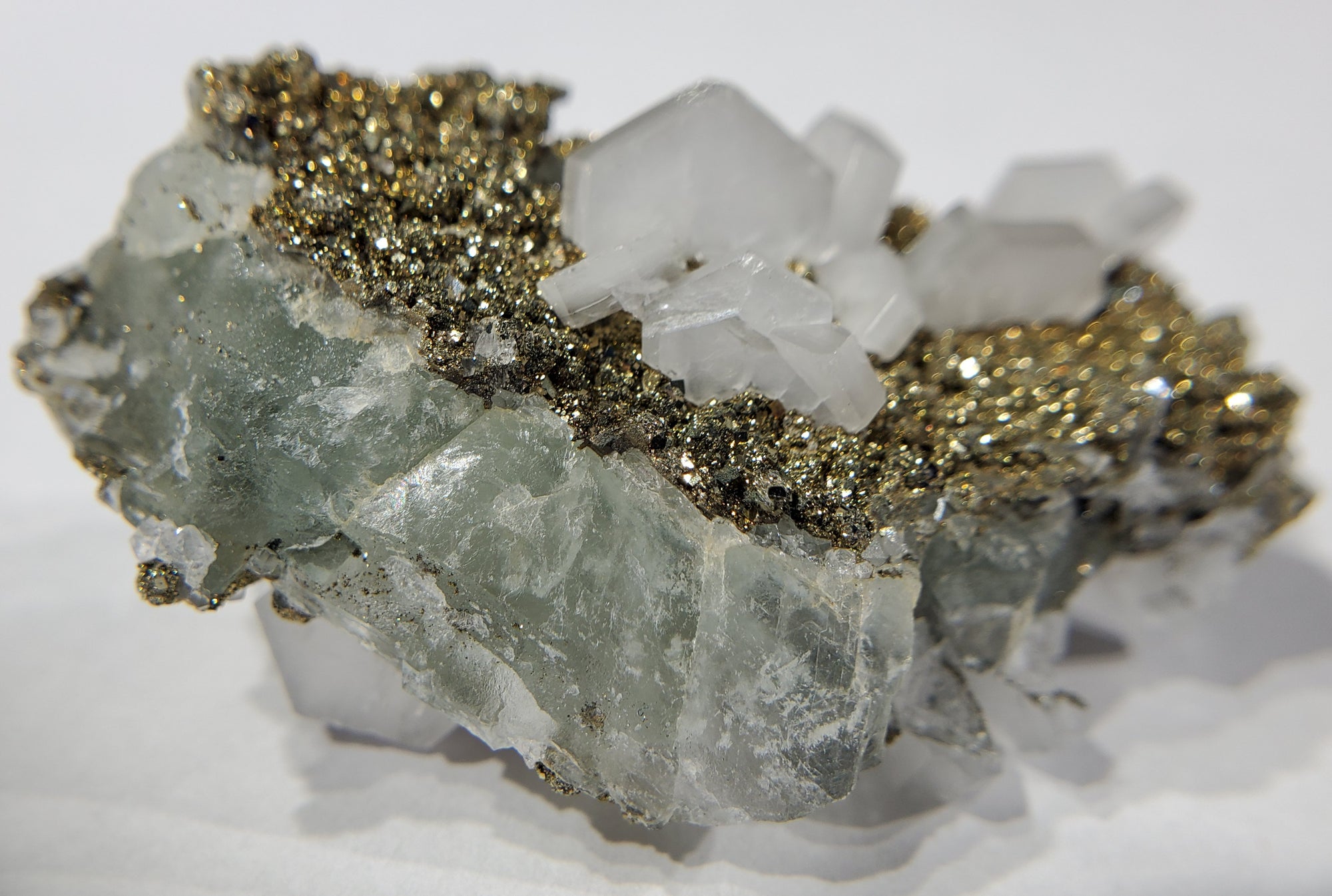 Calcite and Pyrite on Fluorite