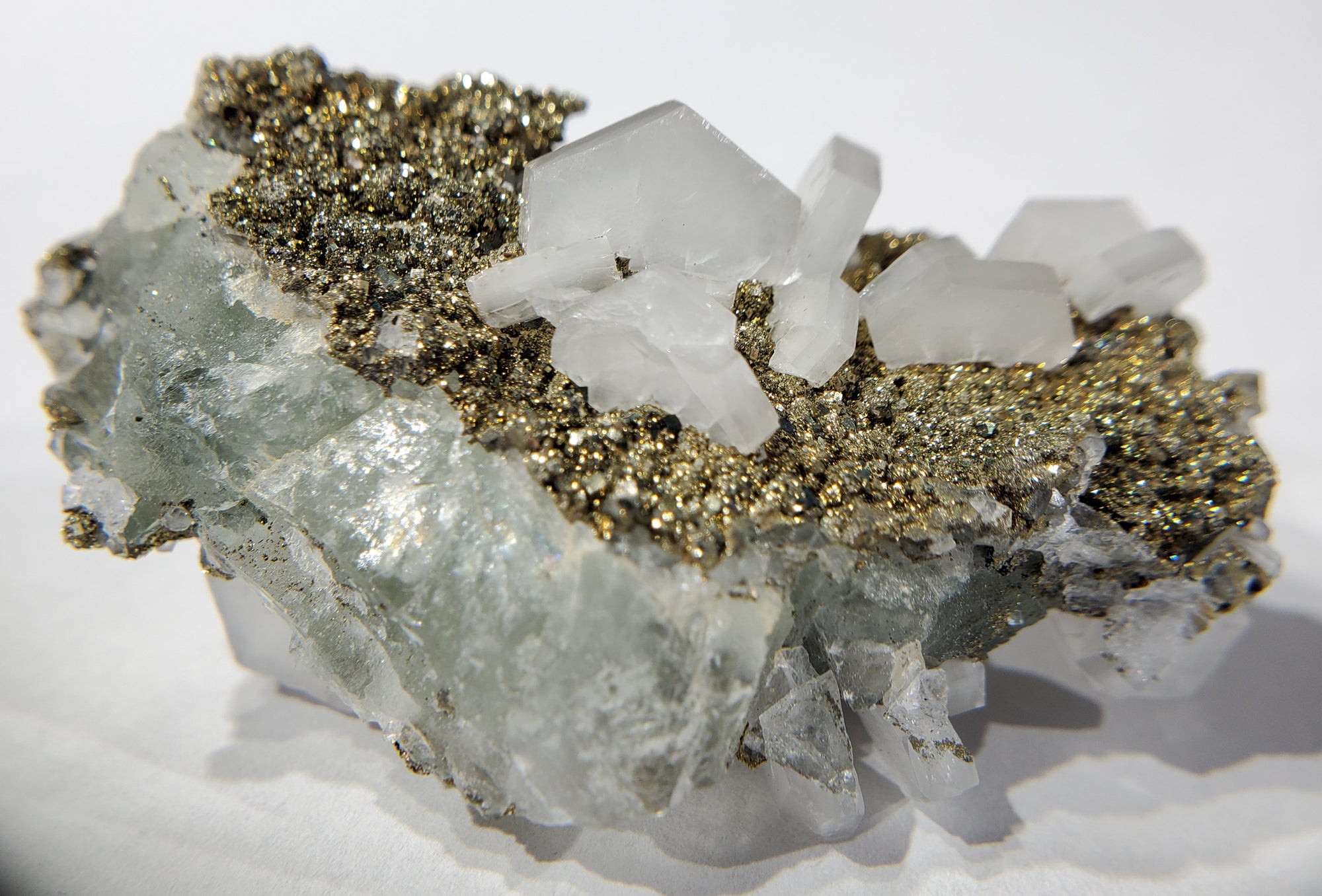 Calcite and Pyrite on Fluorite