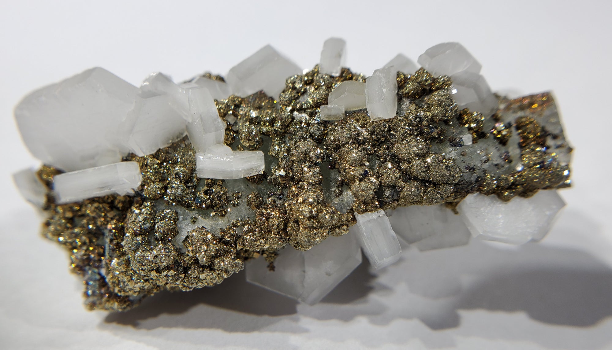 Calcite and Pyrite on Fluorite