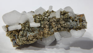 Calcite and Pyrite on Fluorite