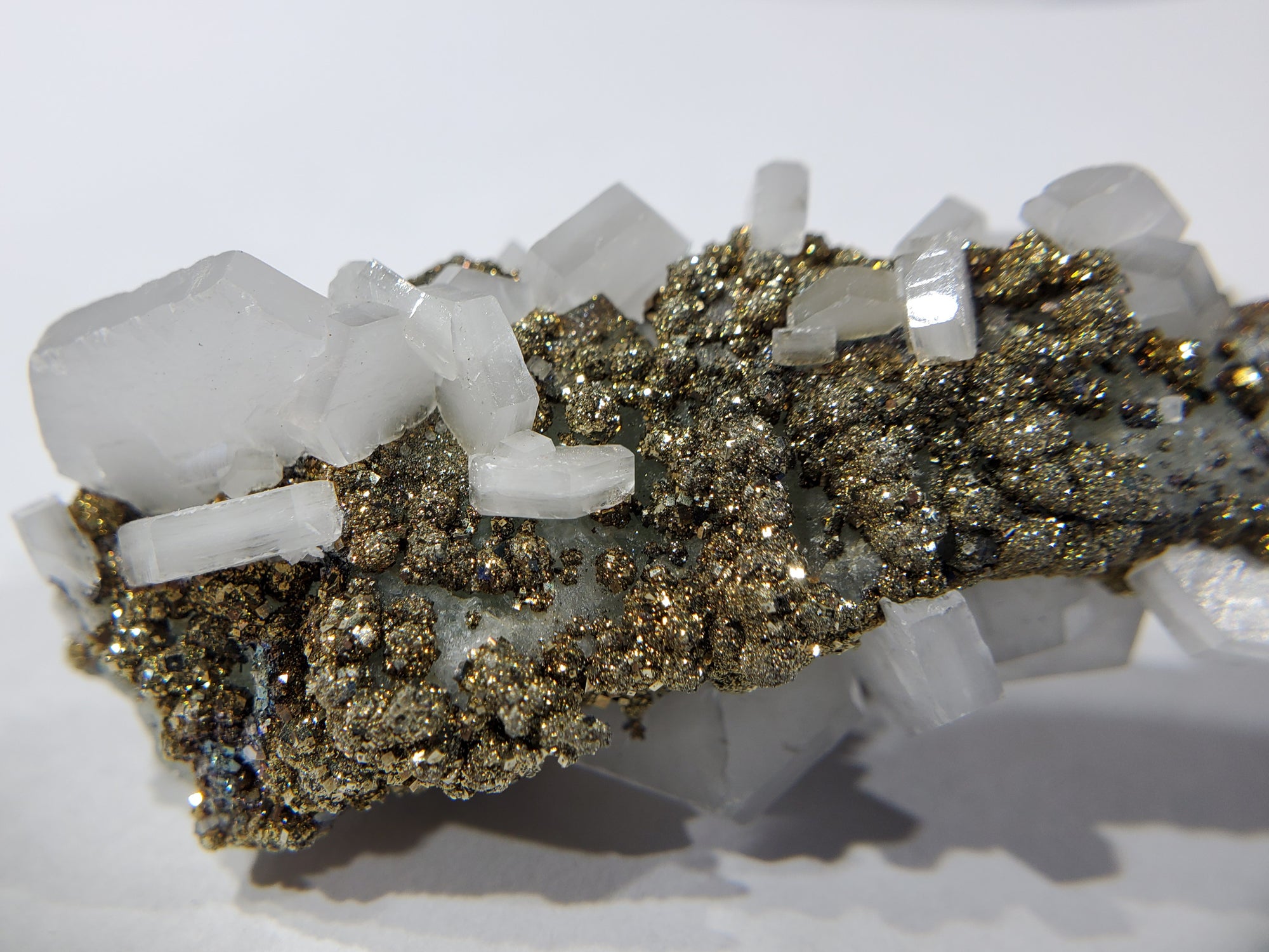 Calcite and Pyrite on Fluorite