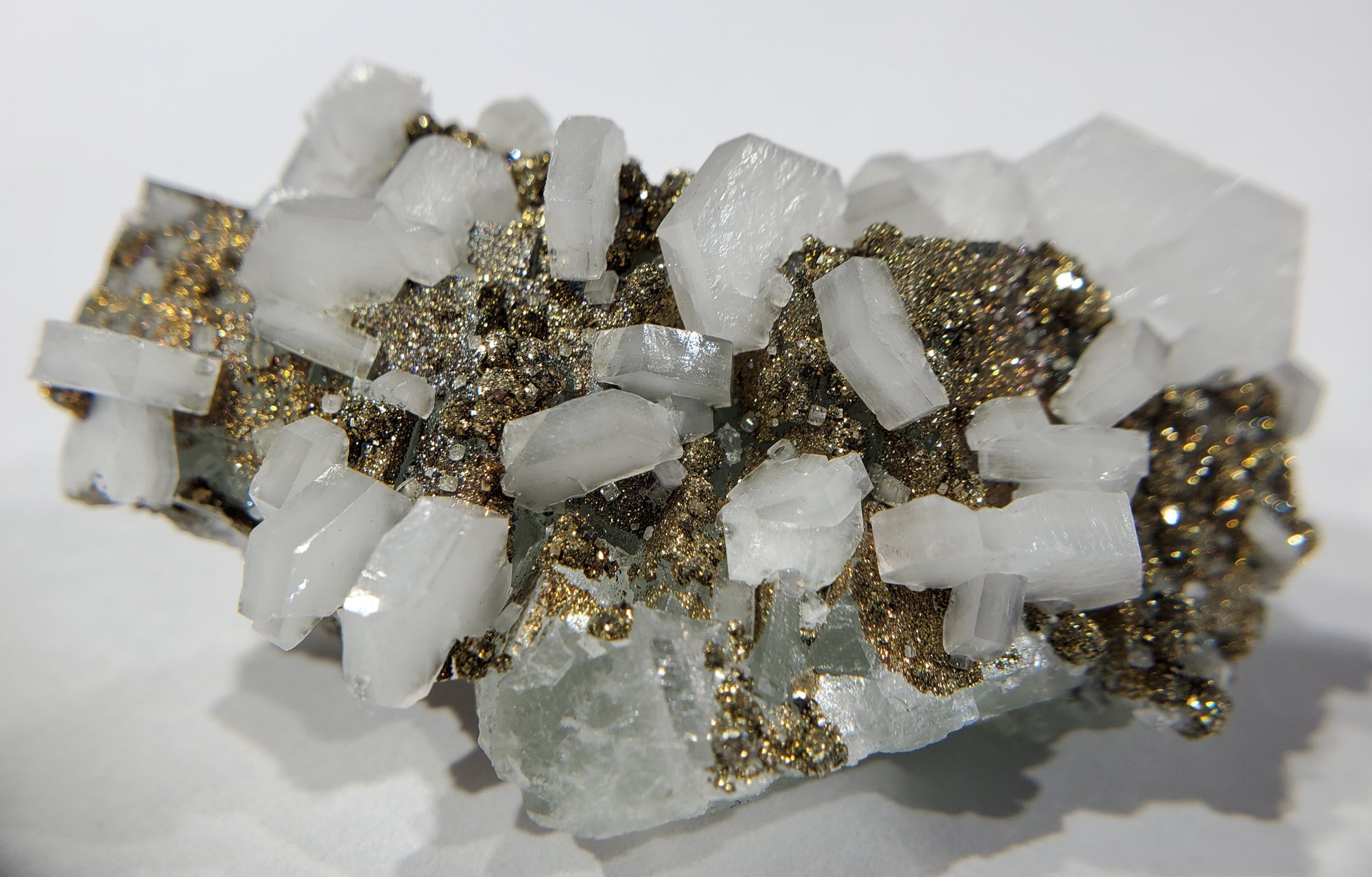 Calcite and Pyrite on Fluorite