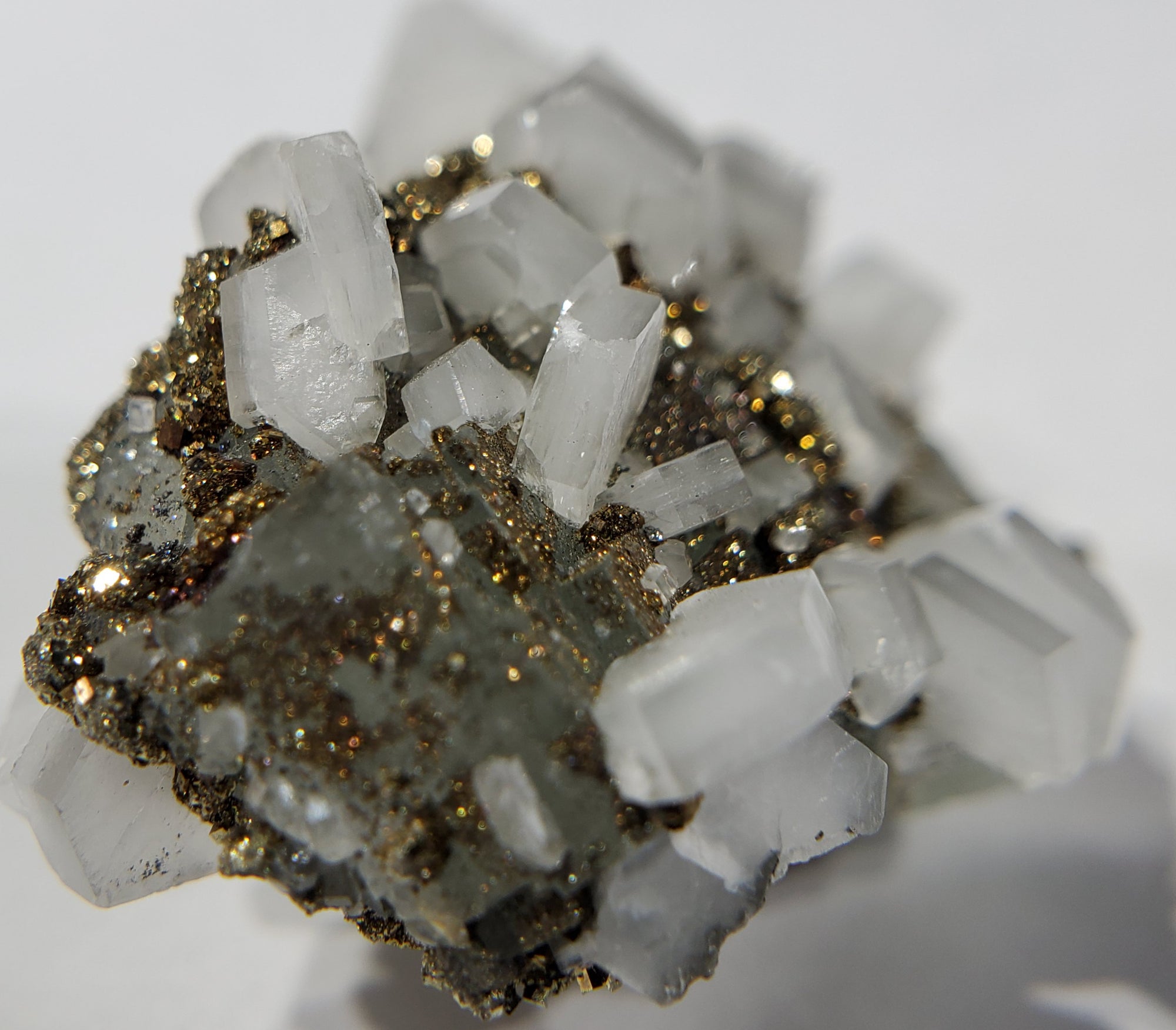 Calcite and Pyrite on Fluorite