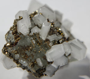 Calcite and Pyrite on Fluorite