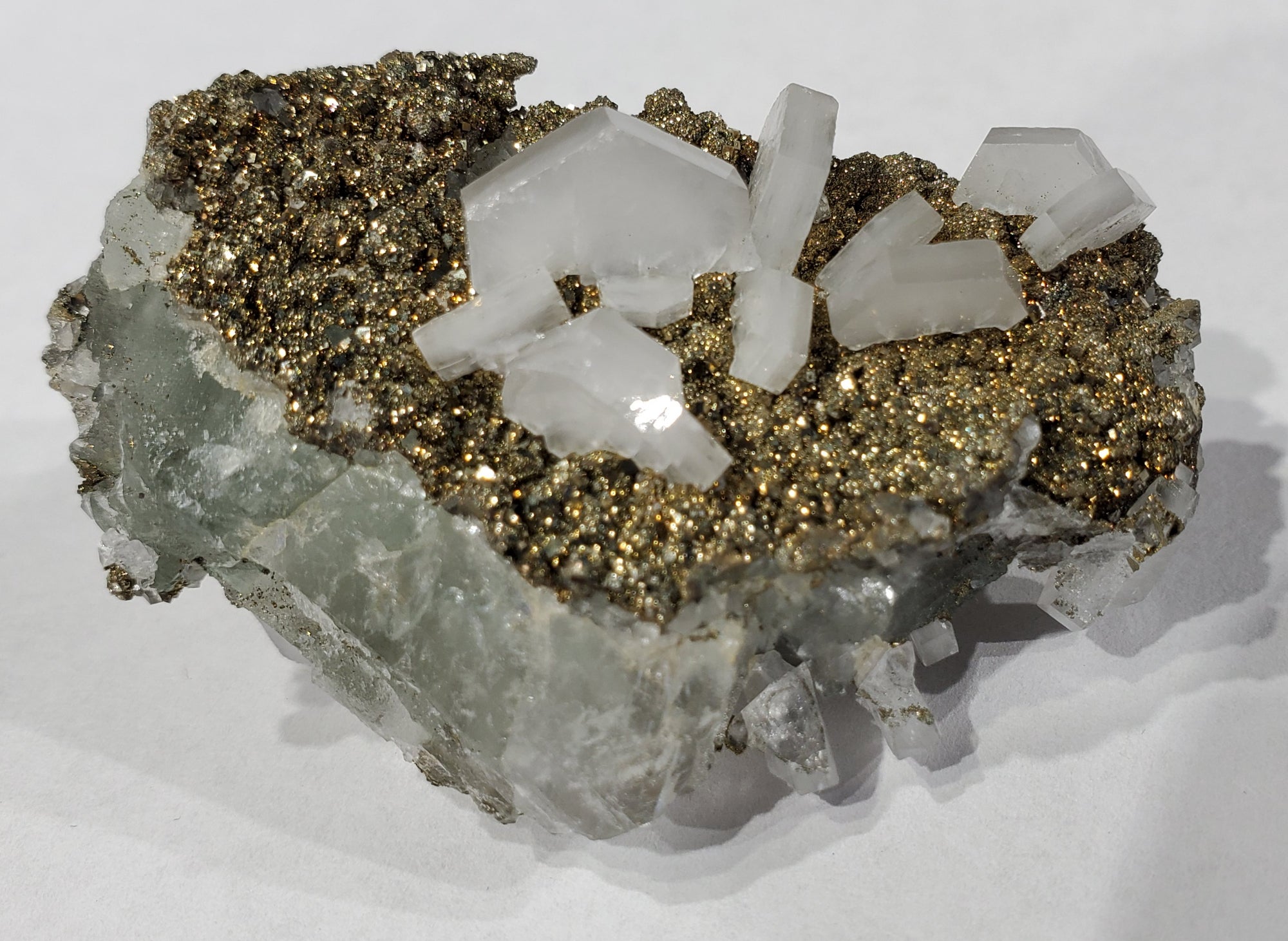 Calcite and Pyrite on Fluorite