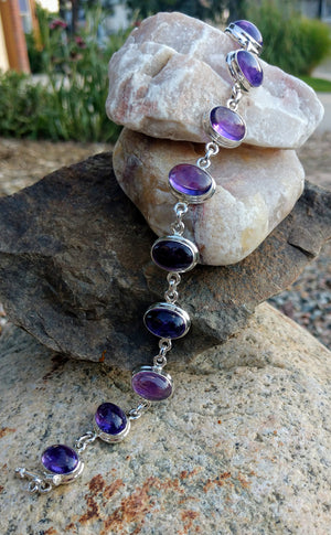 Amethyst bracelet in sterling silver setting.