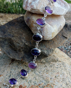 Amethyst bracelet in sterling silver setting.