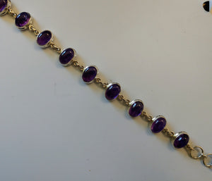 Amethyst bracelet in sterling silver setting.