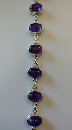 Amethyst bracelet in sterling silver setting.