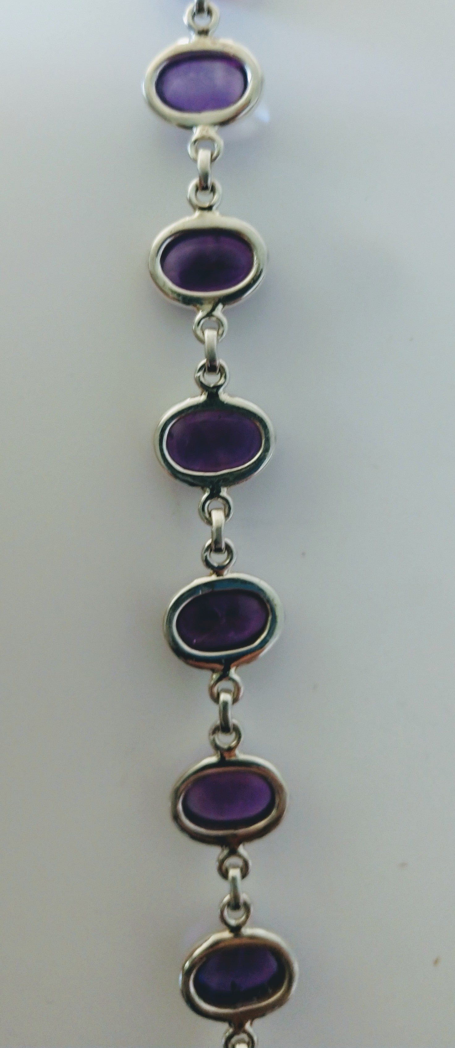 Amethyst bracelet in sterling silver setting.