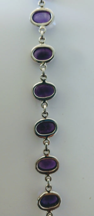 Amethyst bracelet in sterling silver setting.