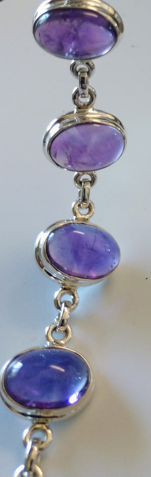 Amethyst bracelet in sterling silver setting.