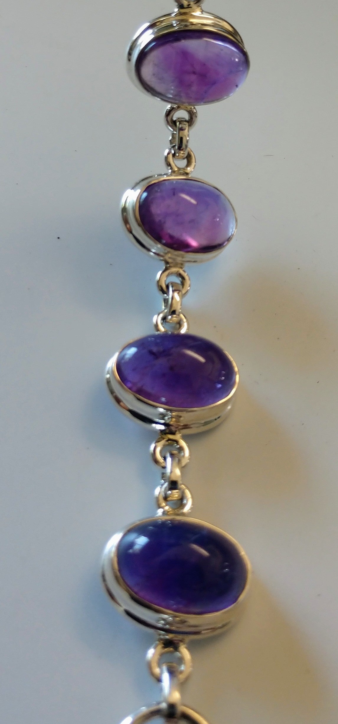 Amethyst bracelet in sterling silver setting.