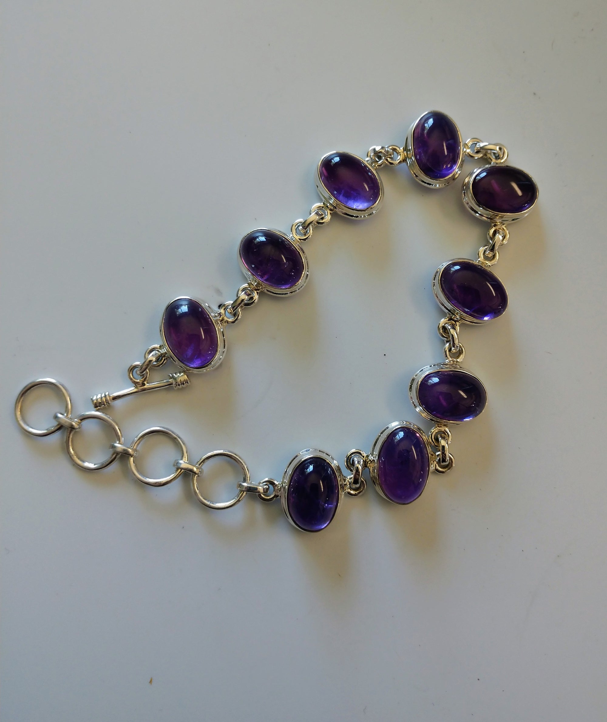 Amethyst bracelet in sterling silver setting.