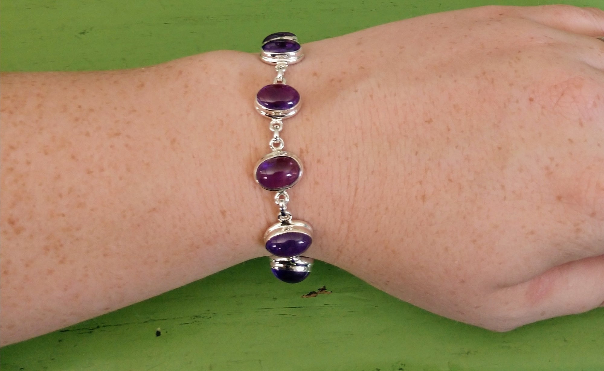 Amethyst bracelet in sterling silver setting.