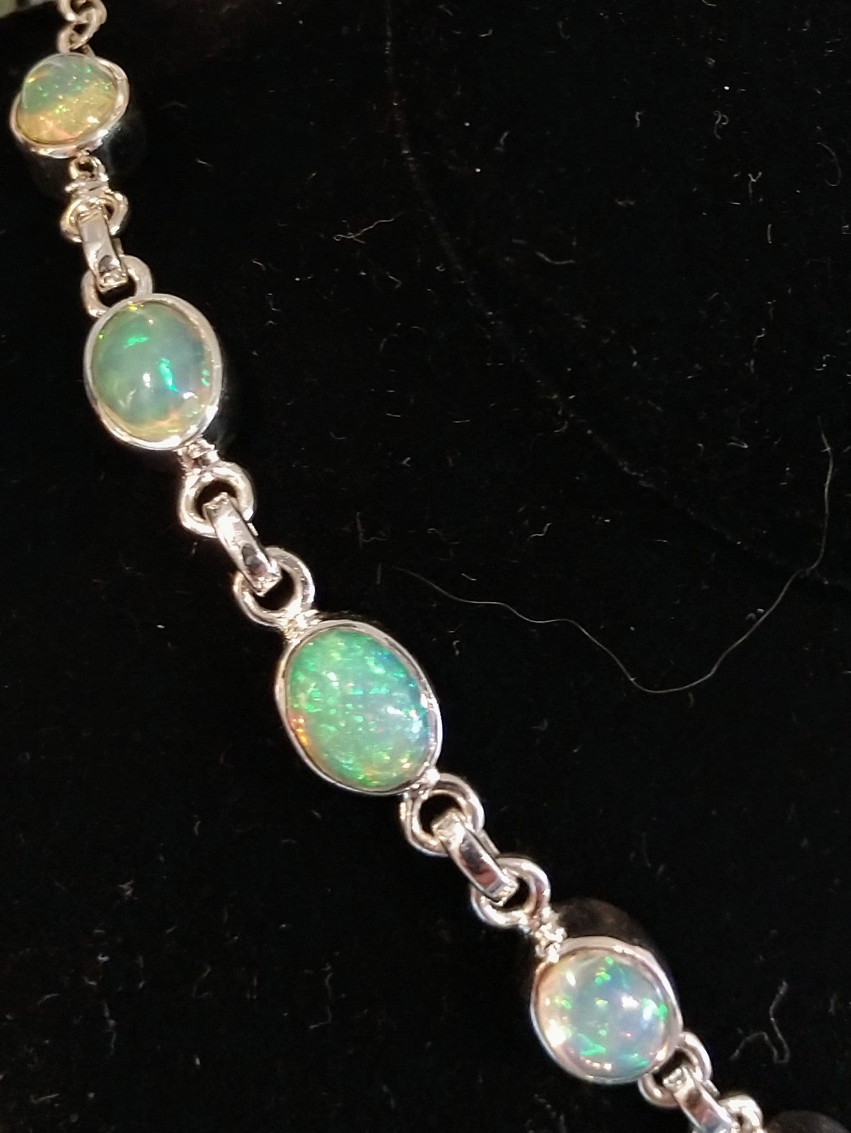 Opal necklace in sterling silver setting