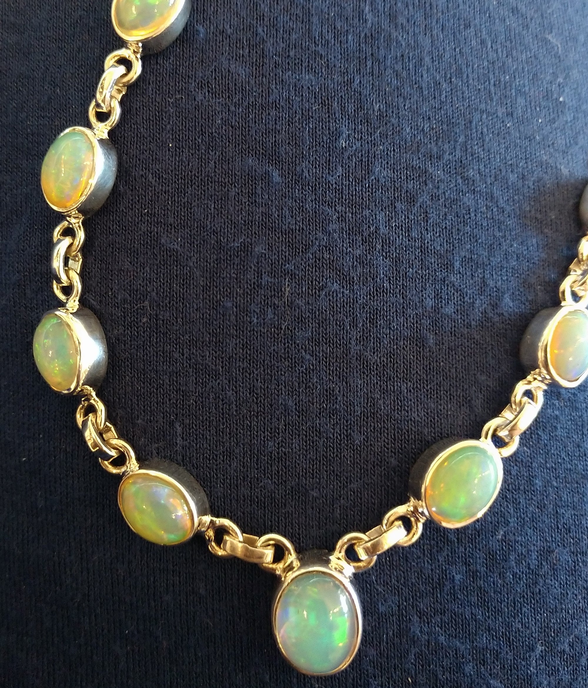 Opal necklace in sterling silver setting