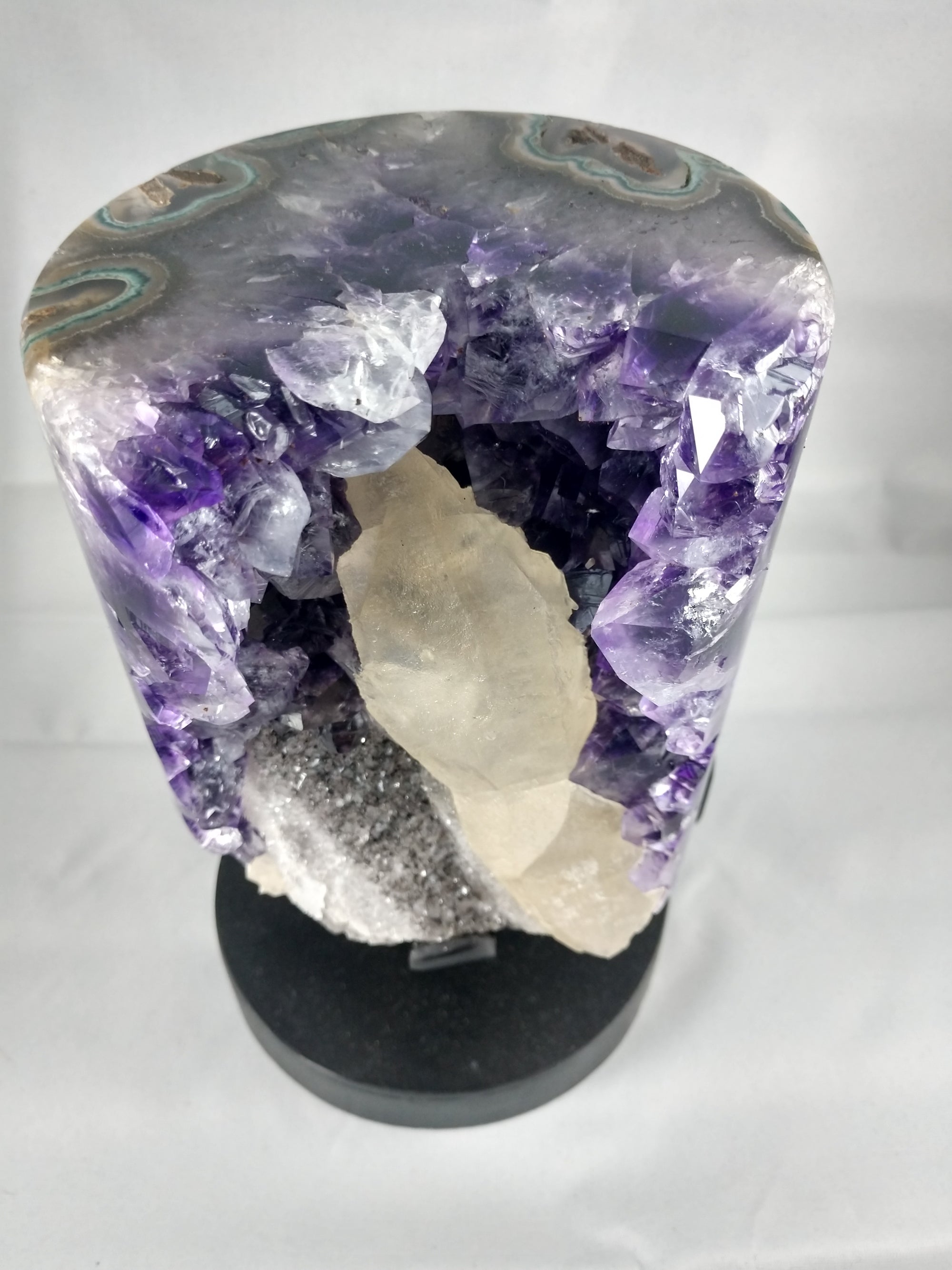 Amethyst w/ calcite formation on custom rotating metal stand