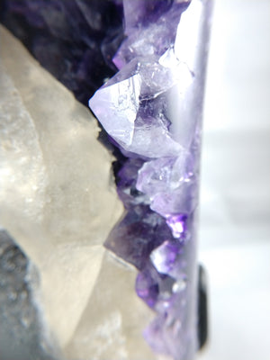 Amethyst w/ calcite formation on custom rotating metal stand